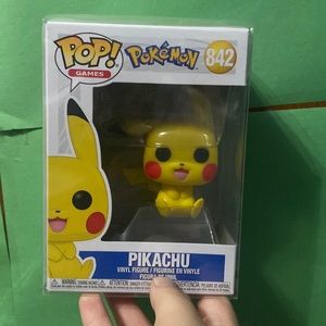 Pikachu Funko Pop in its protectors case box(Pokemon- 842)